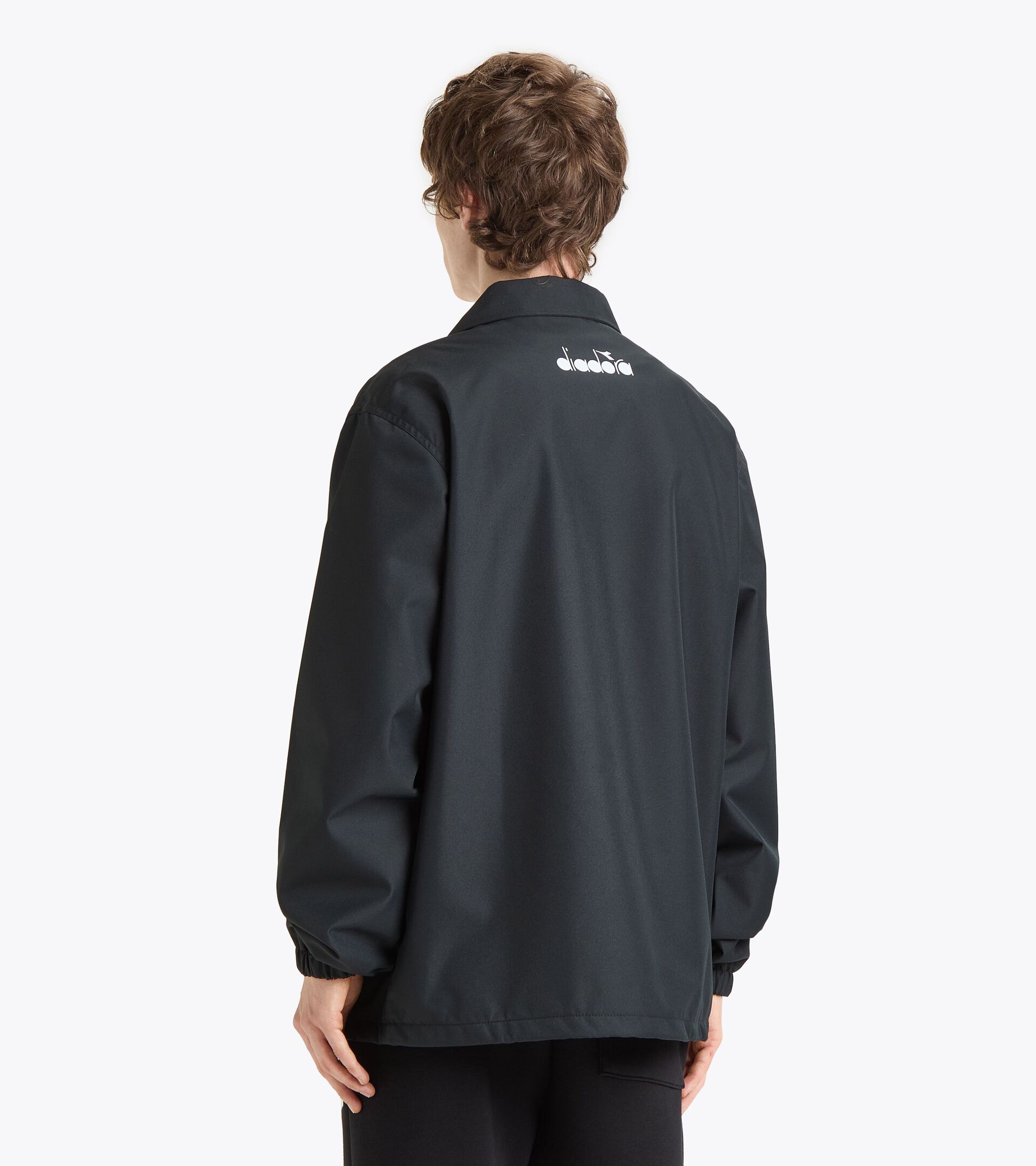 Winddichte Jacke - Genderneutral JACKET COACH ROUTE SCHWARZ - Diadora